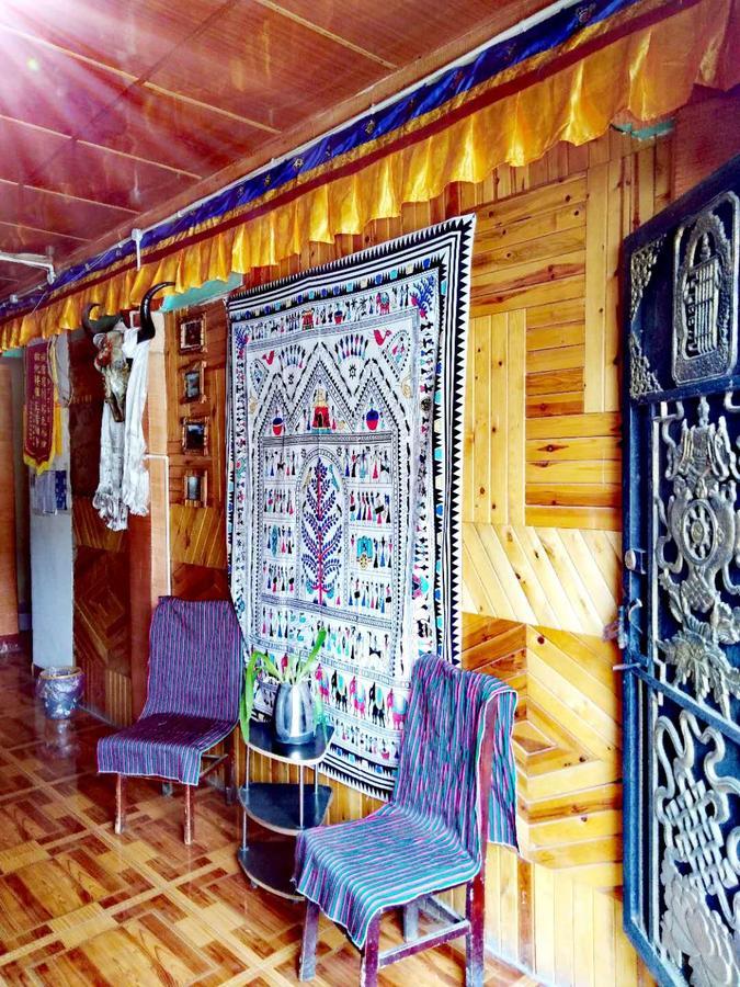 Zishuo Zihua Guest House Daocheng Esterno foto