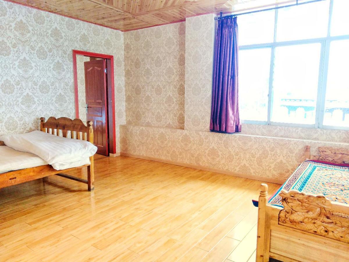 Zishuo Zihua Guest House Daocheng Esterno foto