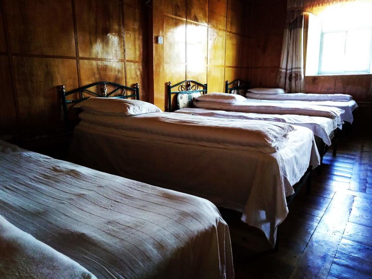Zishuo Zihua Guest House Daocheng Esterno foto
