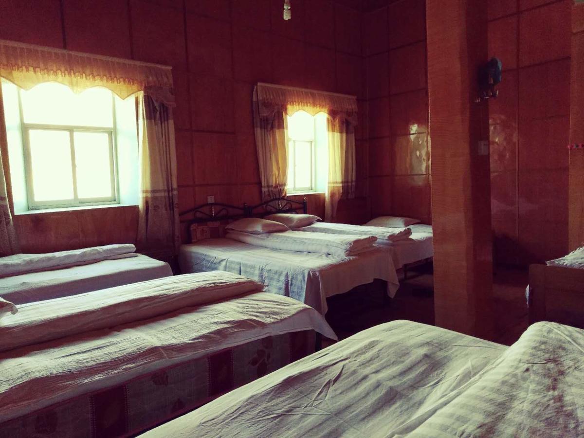 Zishuo Zihua Guest House Daocheng Esterno foto