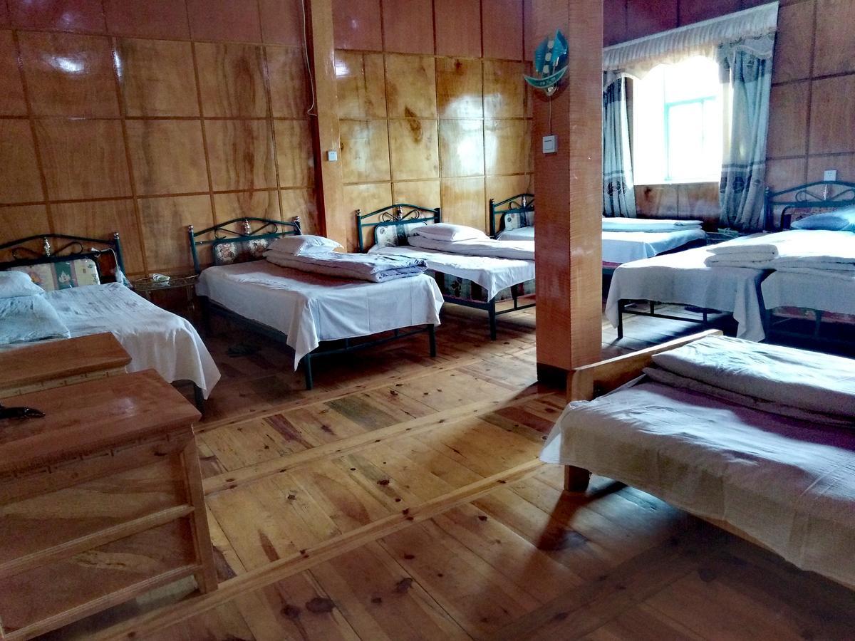 Zishuo Zihua Guest House Daocheng Esterno foto