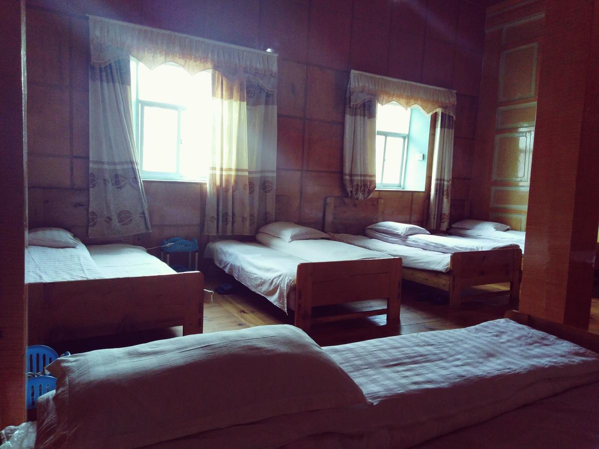 Zishuo Zihua Guest House Daocheng Esterno foto