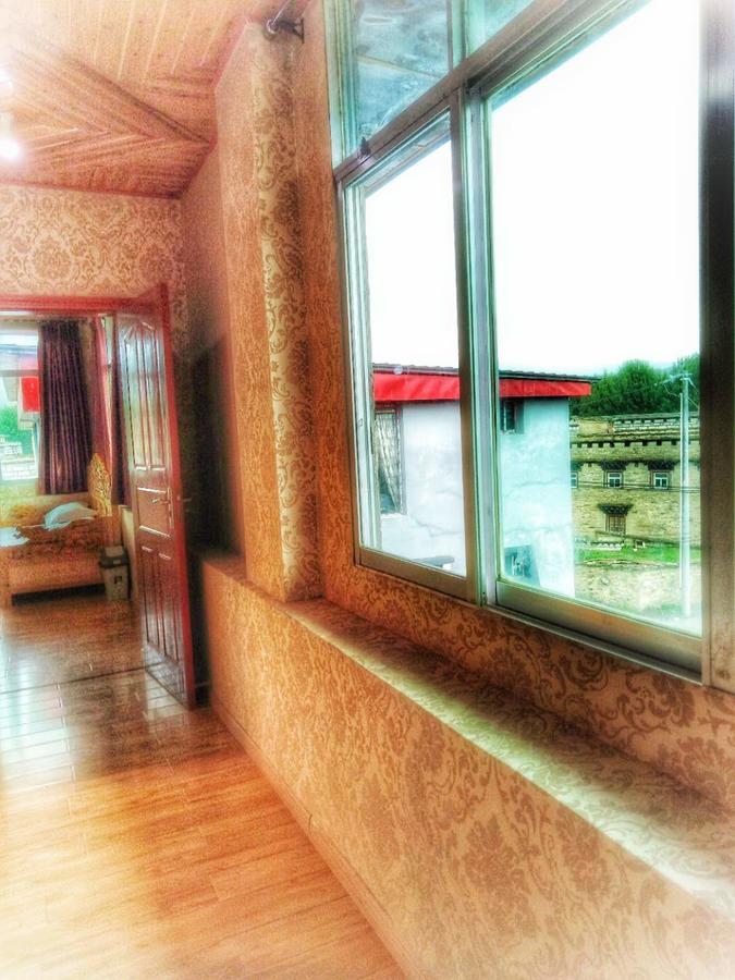 Zishuo Zihua Guest House Daocheng Esterno foto
