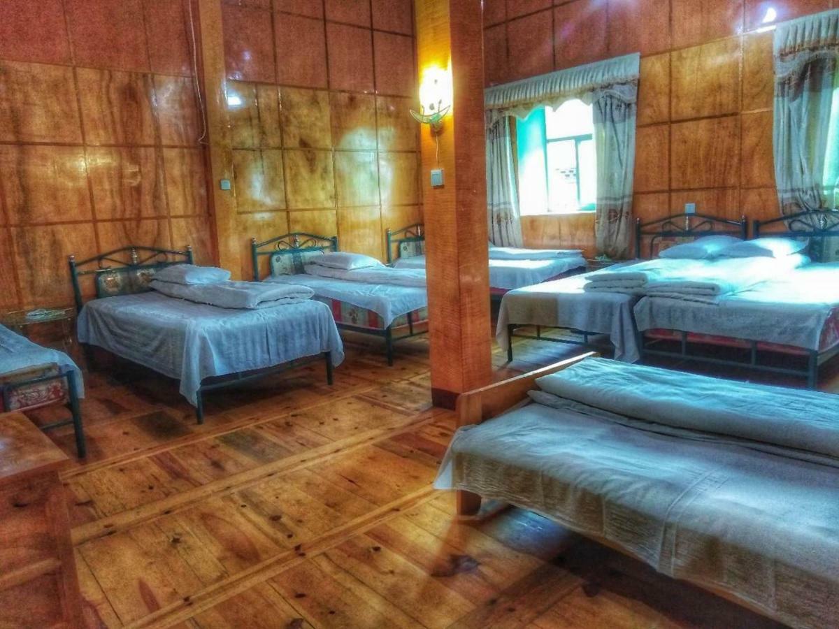 Zishuo Zihua Guest House Daocheng Esterno foto