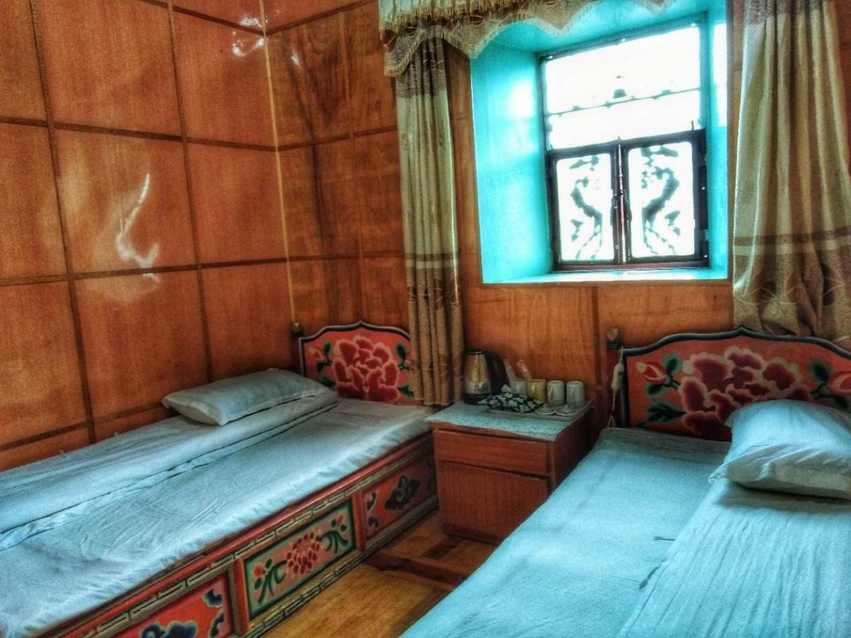 Zishuo Zihua Guest House Daocheng Esterno foto