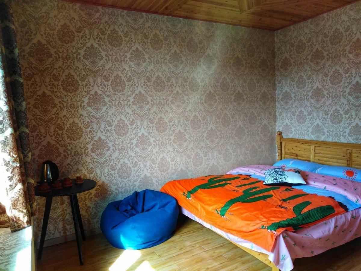 Zishuo Zihua Guest House Daocheng Esterno foto