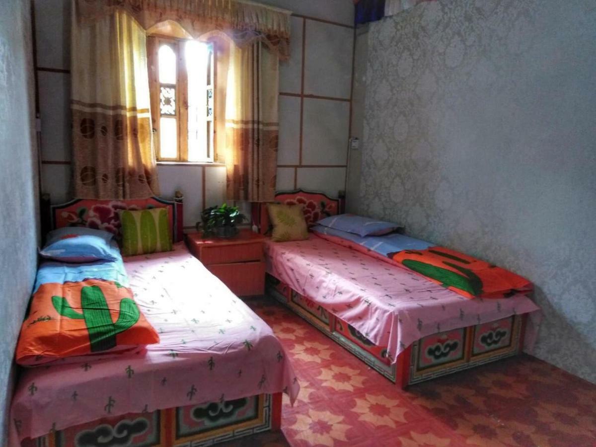 Zishuo Zihua Guest House Daocheng Esterno foto